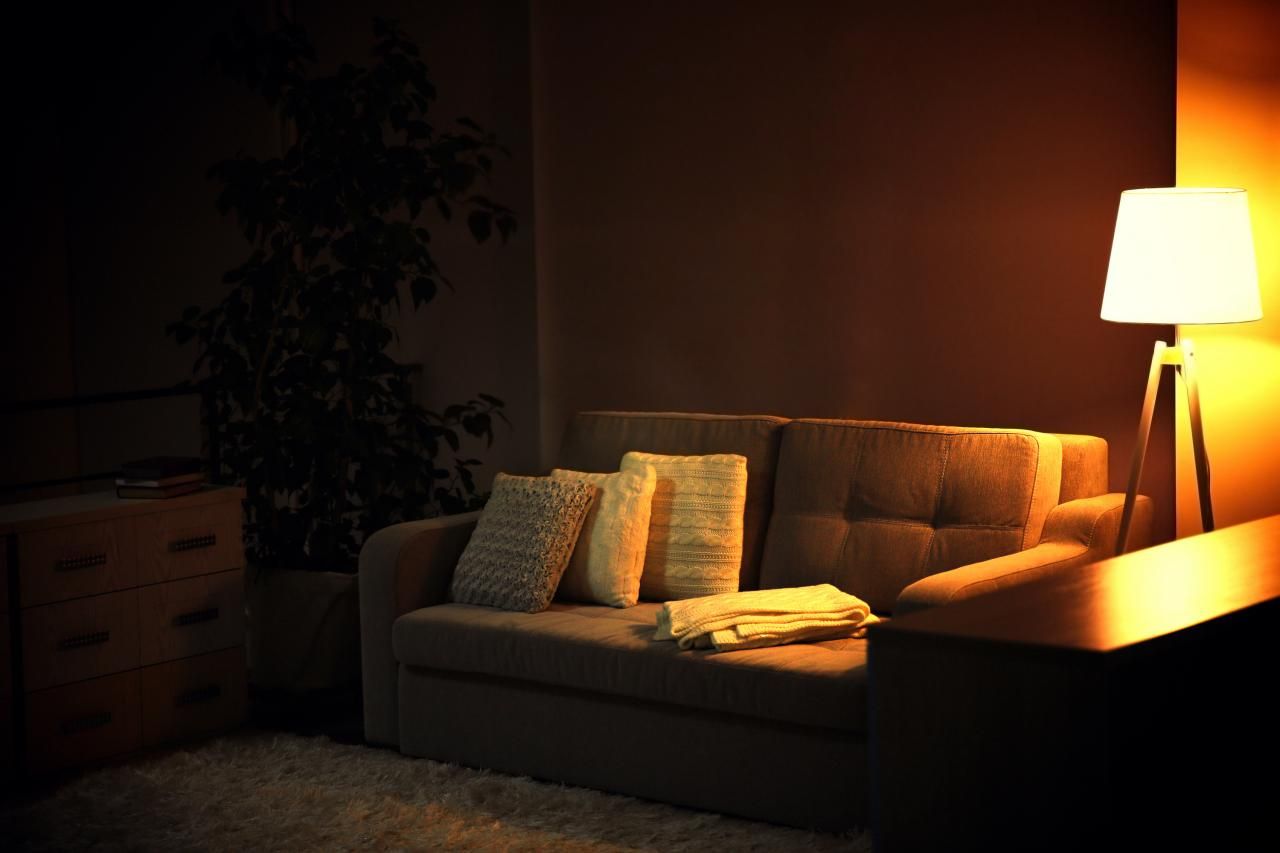 Soft evening indoor light over a quiet corner suited to winding down before gentle stretches